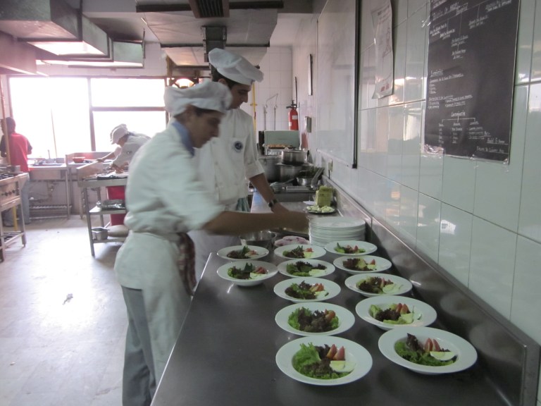 Salads being plated